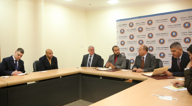 hacker paper exam Agreement Signs an Ajman University with of Cooperation