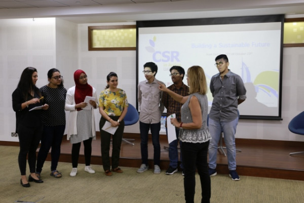 طلبة جامعة عجمان وخريجوها يشاركون في برنامج CSR in Action