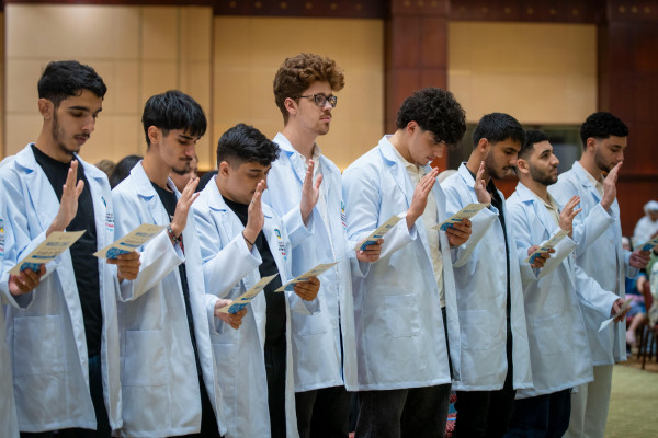 Parents Applauded as True Heroes at White Coat Ceremony for Pharmacy Students at Ajman University